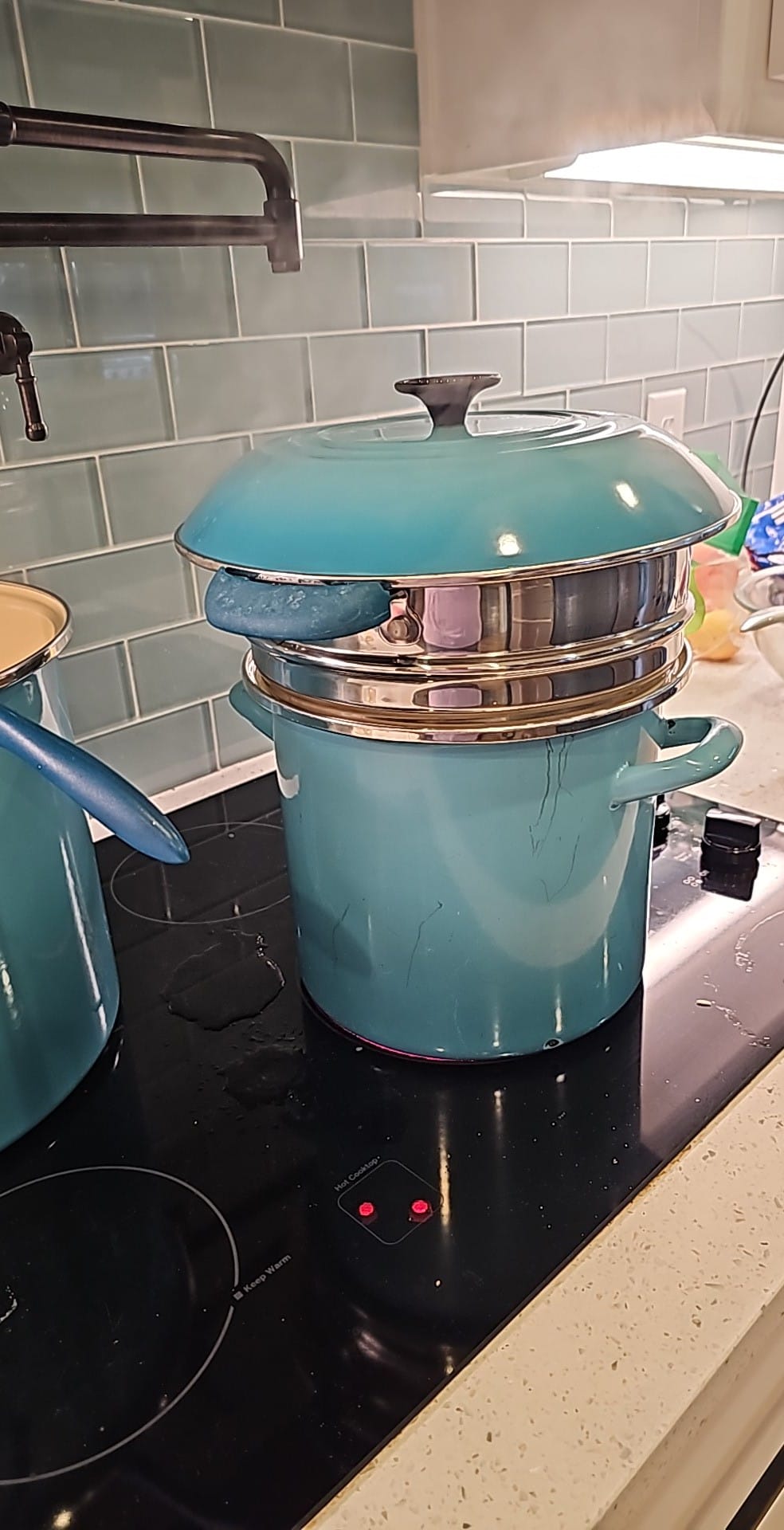 Listen. Not all Texans have a clue. This is how tamales are happening. There are mismatched pots and accessories and dripping water burning on the stove. But they will be yummy!